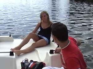 blonde sucks dick on a boat in full view of the city