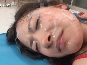 Busty asian slut getting face jizz covered
