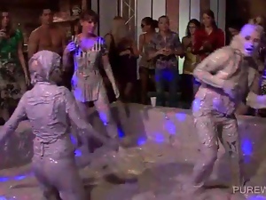 Hot bodied lesbos fighting in messy mud at a sex party
