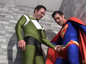Superman Submits Part 1 GAY BALLBUSTING SPANDEX CHASTITY