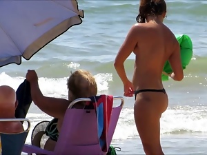 Topless teen with not her grandfathers at beach