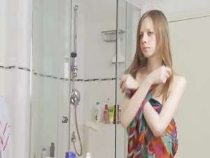 Ultra slim girl in the shower